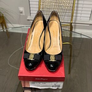Salvatore Ferragamo Black Patent Leather Bow Pumps with Gold Plate